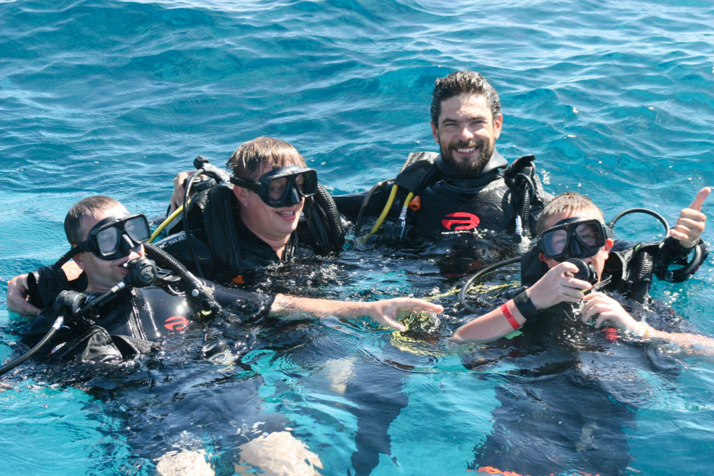 Scuba divers on the surface