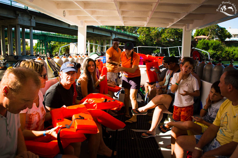 Guests receiving the life jackets and national park entry