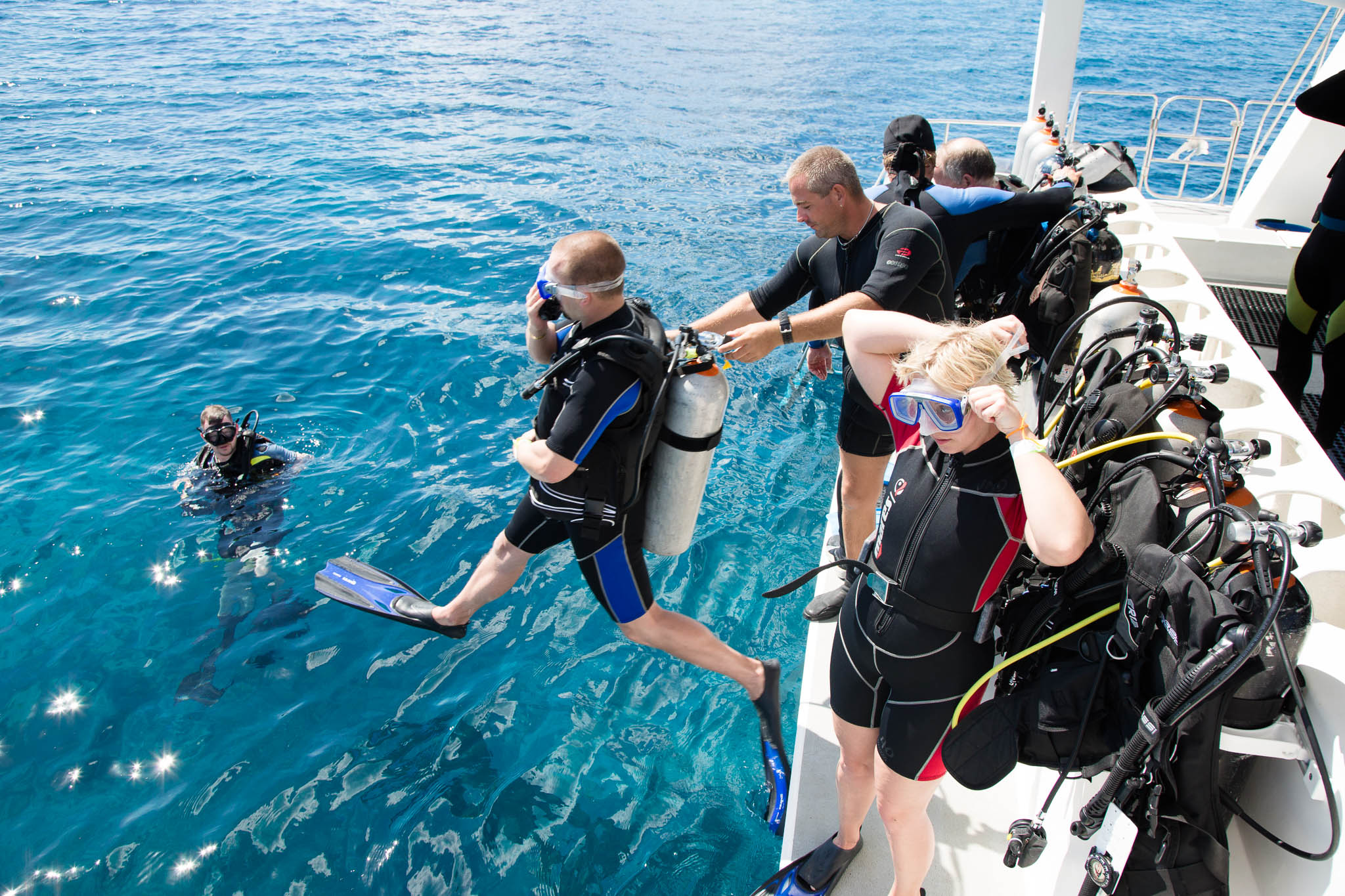 Diver jumping off boat at Catalina Island