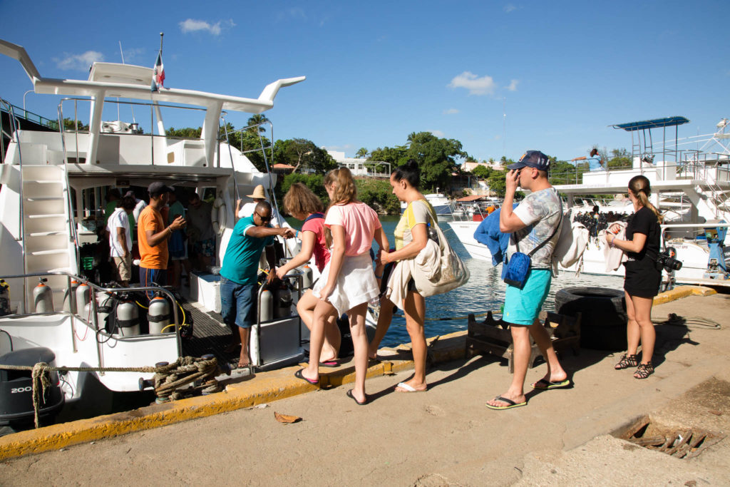 Customers boarding a Passion Paradise excursion